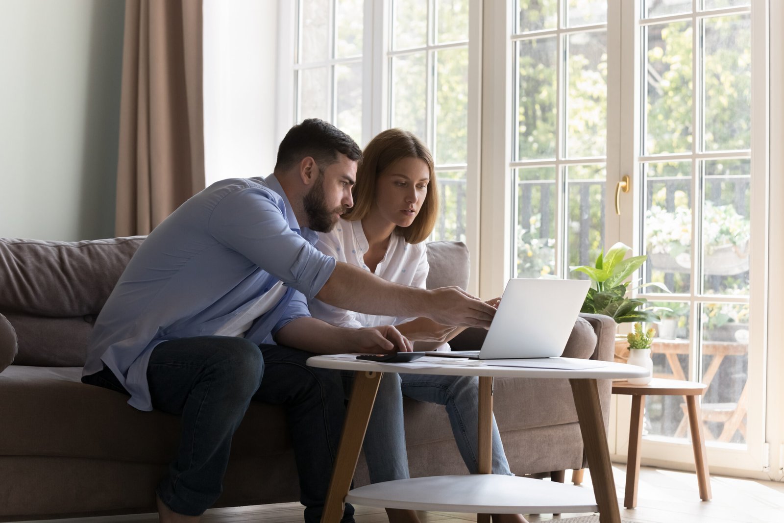 selling your home in Tampa Bay couple reviewing finances