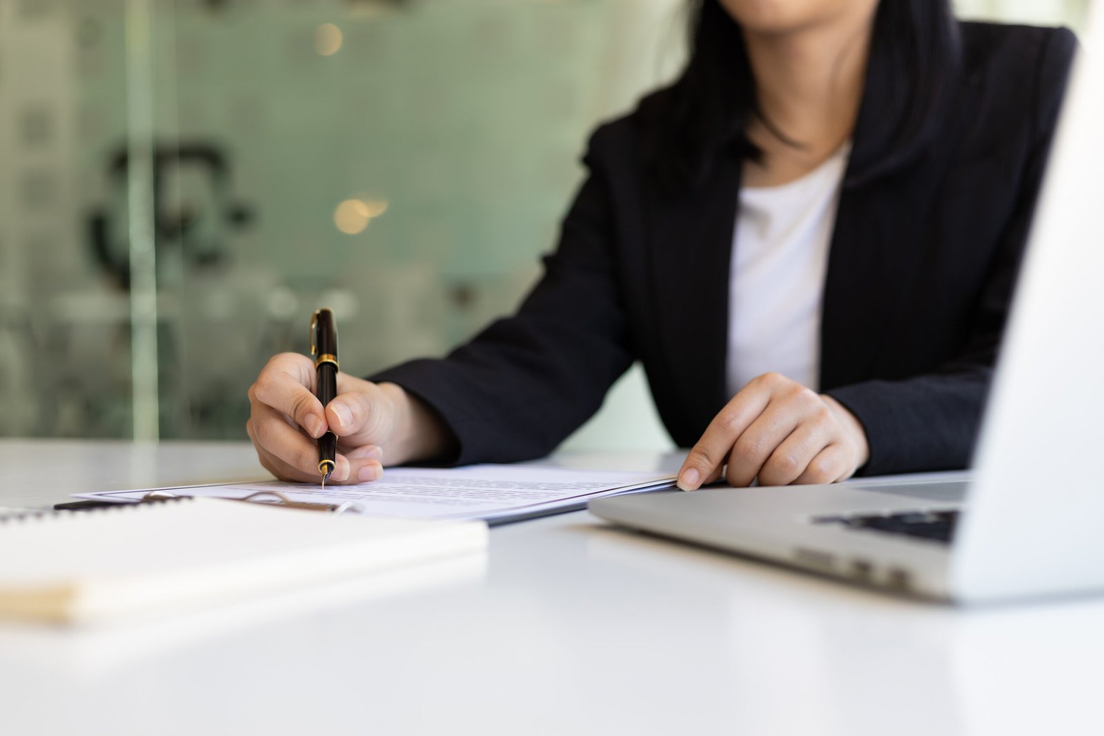 divorce home sale woman reviewing documents